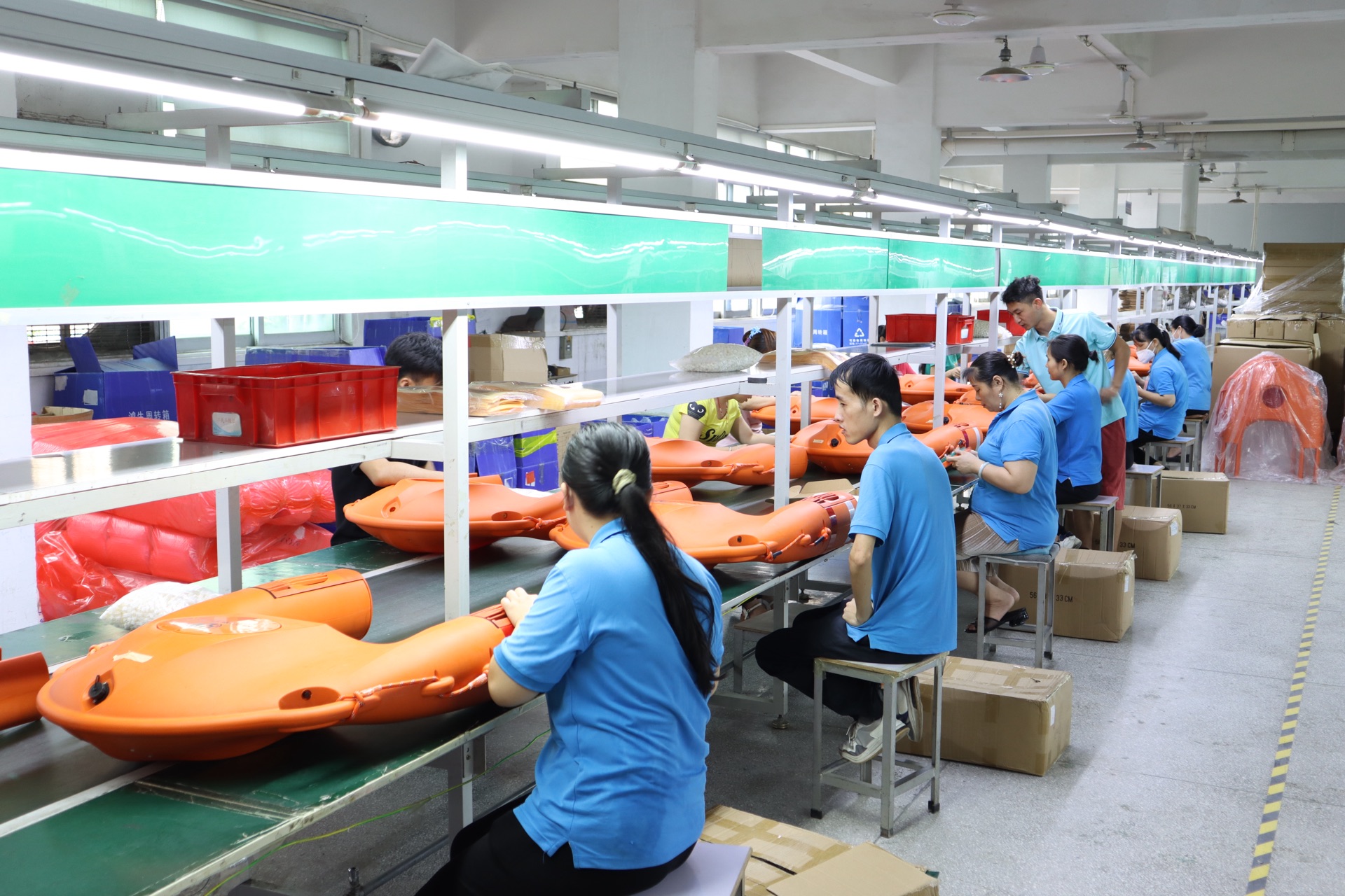 XinHongXin factory floor — full assembly line producing rescue craft in Shenzhen